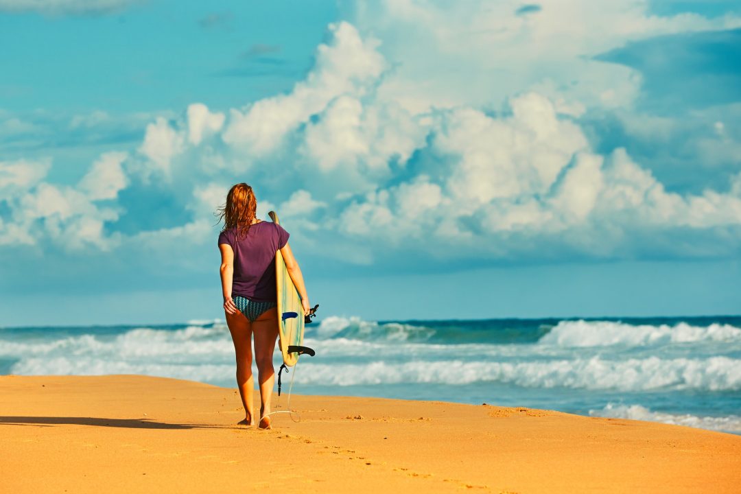 surfer girl an the beach 1